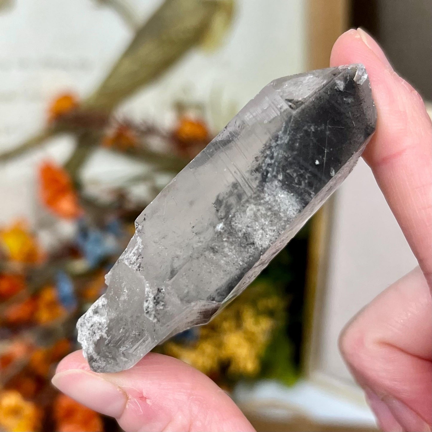 Raw Quartz Point with Black Lodolite and Rutile Incluions from Brazil