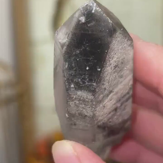 Raw Quartz Point with Black Lodolite and Rutile Incluions from Brazil